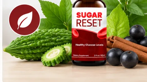 Bitter melon, berries and green leaves arranged beside a bottle of Sugar Reset